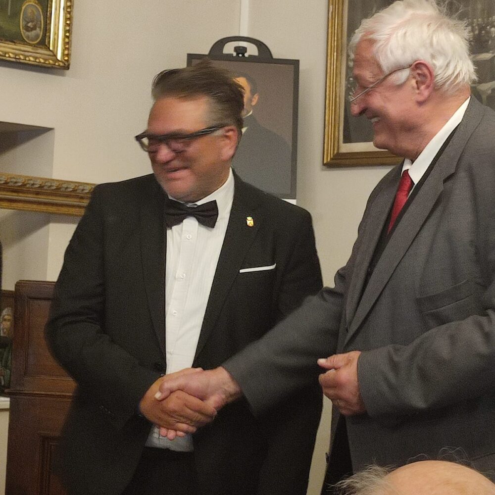 2022 | Zoran Kalabic award handshake with Prof. Dr. Rohrbach